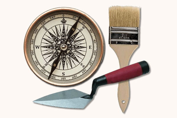A trowel, brush and compass.