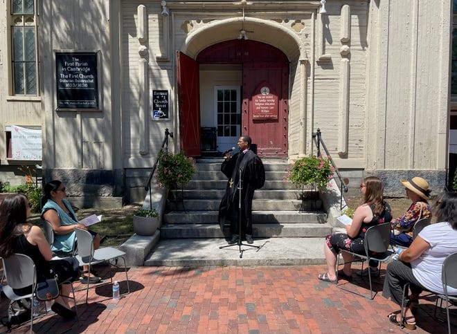 The Rev. Adam Dyer speaks during a service for Michael on June 30, 2022, at First Parish Church in Harvard Square, Cambridge.