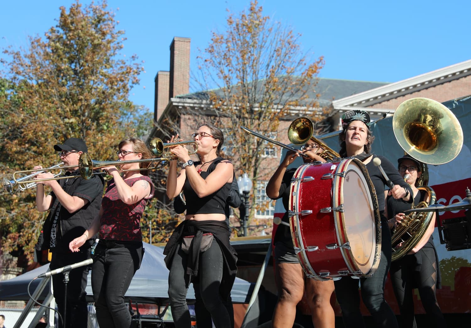 Performers entertain HONK! Parade crowds from a stage set up in the Square.