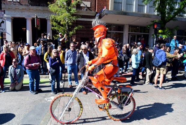 CAMBRIDGE, MA October 9: People watch as Skull Head rides by in the parade as it marches into Harvard Square during the 17th Annual Honk! Parade on Massachusetts Ave, part of the 43rd annual Octoberfest in Harvard Square, Sunday,October 9, 2022, in Cambridge, Mass. (Photo By Jim Michaud/ Boston Herald)