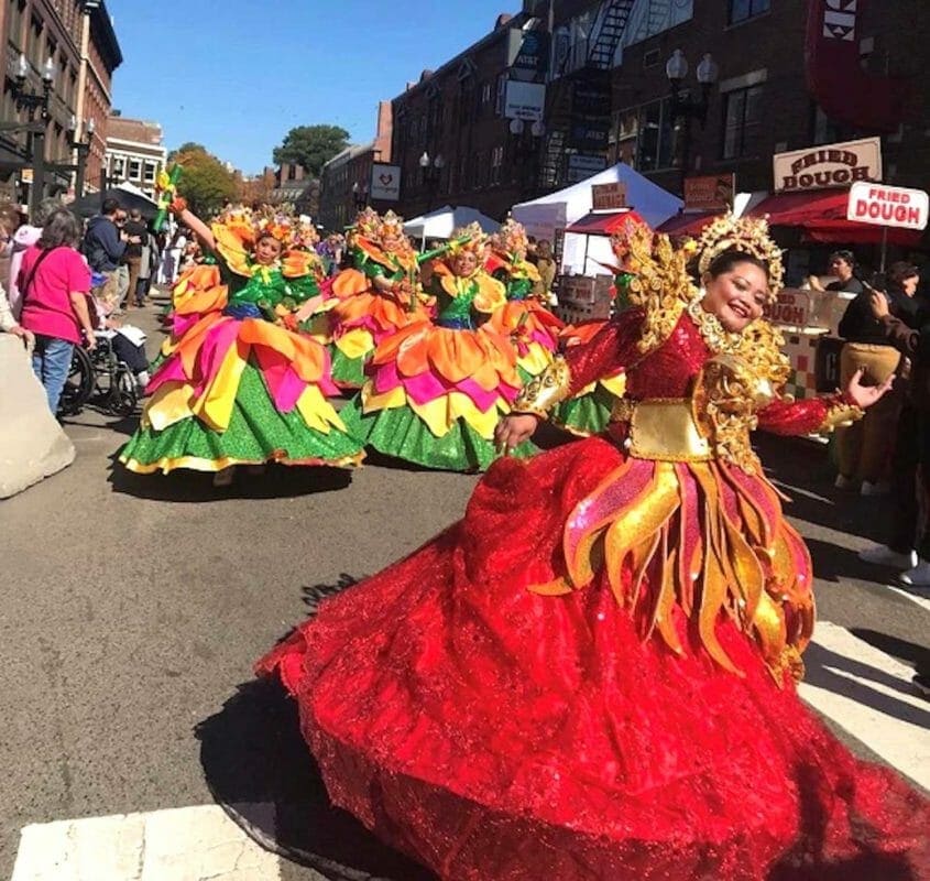 Street performers from Cebu, Inc. dazzle with their Sinulog dance and colorful costumes. Photo by Cathy Uy 