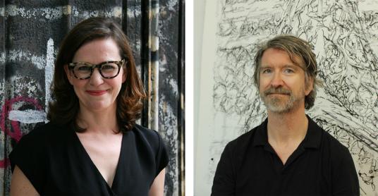 Side-by-side headshots of a man and woman both wearing black shirts and smiling at the camera.