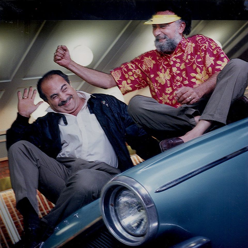 Brothers Ray, left, and Tom Magliozzi co-hosted "Car Talk" together for 35 years. When they moved into their Harvard Square office, they began their time there with a joke: an official-looking sign for a fictional law firm called "Dewey, Cheetham & Howe." It's since become an historic landmark.