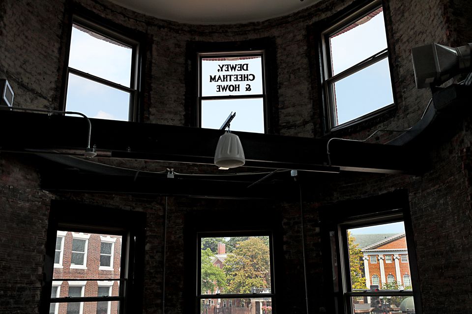 The famed "Dewey Cheetham & Howe" window sign in Harvard Square was preserved in a recent renovation of The Abbott building, where it once graced the office of the long-running radio show "Car Talk."