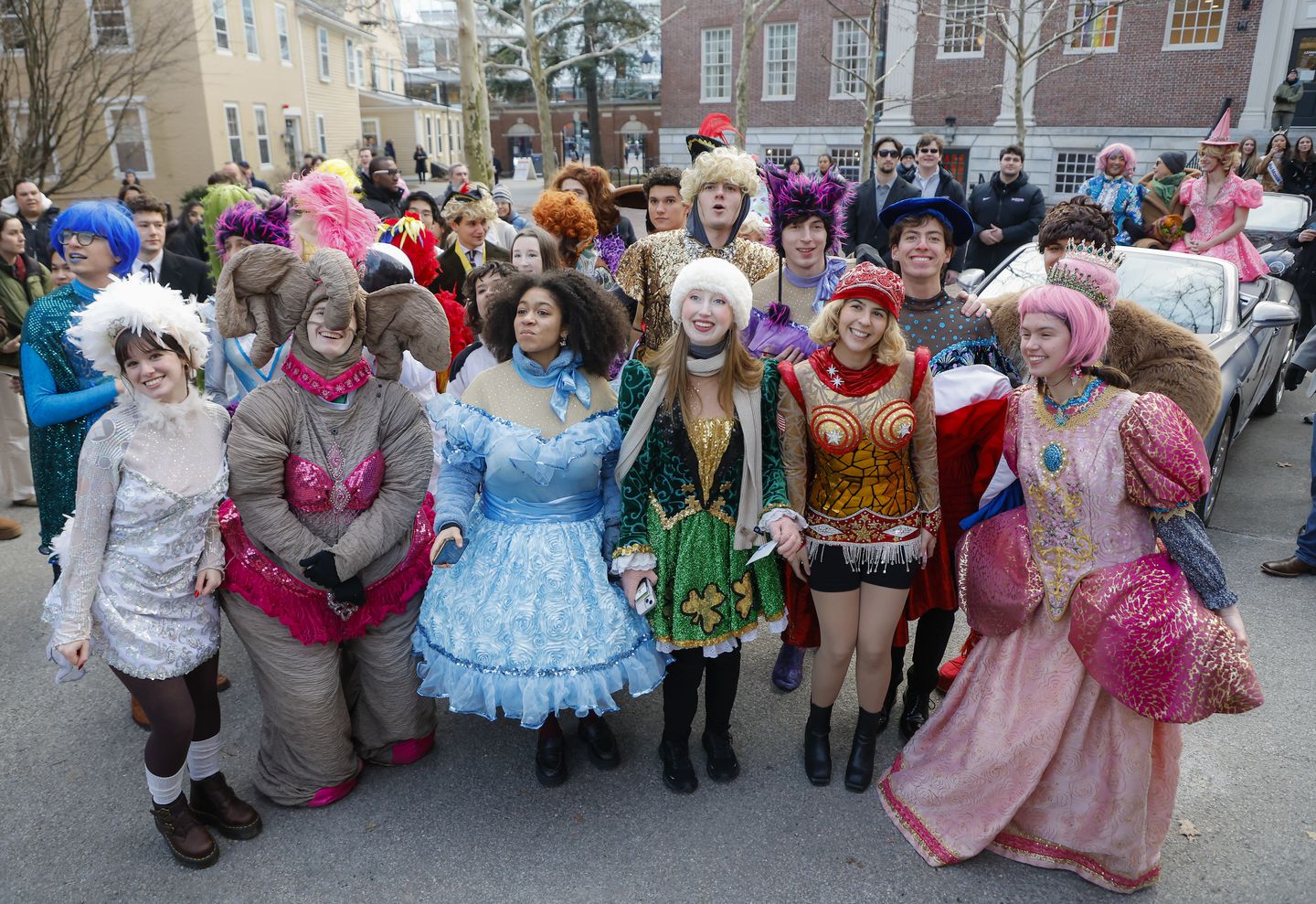 Members of Hasty Pudding Theatricals leading out Annette Bening during the parade for Harvard's Hasty Pudding Woman of the Year on Tuesday.

