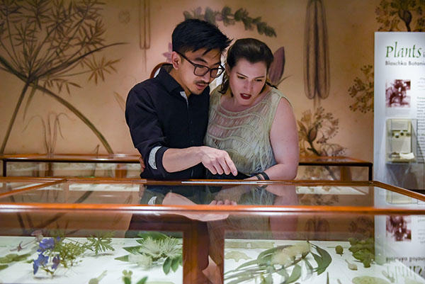 man and woman in Glass Flowers gallery.