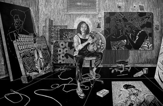 A black and white print shows a Black female artist sitting in the center of a studio.