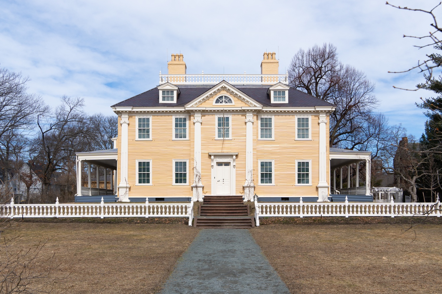 The Longfellow House is located at 105 Brattle Street. The site's credit card limit had been reduced to $1.00 by the Trump administration.