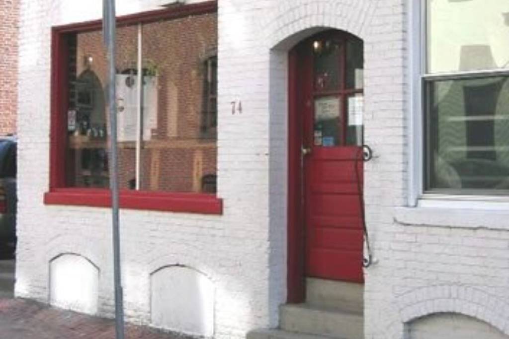 exterior of white brick building
